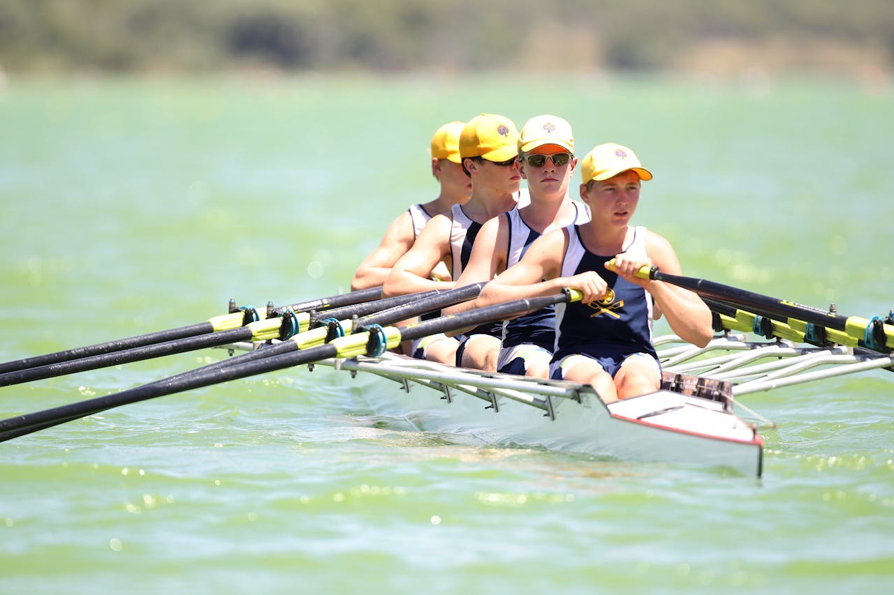 Photo of Men on Watercraft